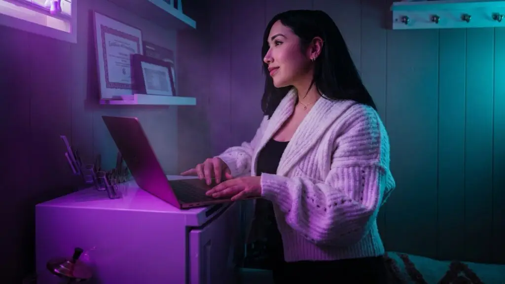 Small business owner managing ads on a laptop