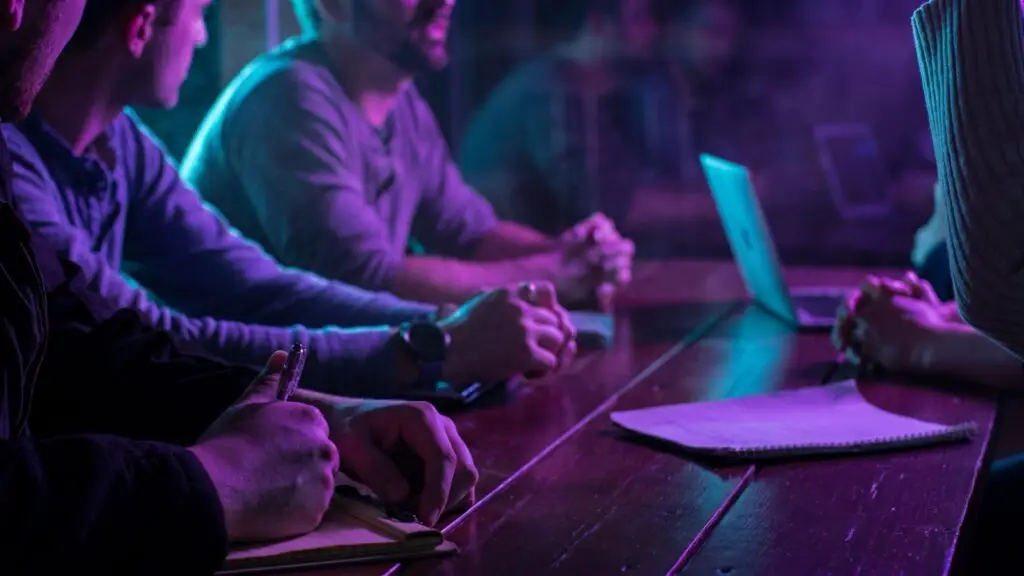 Marketing team reviewing a budget in an office meeting