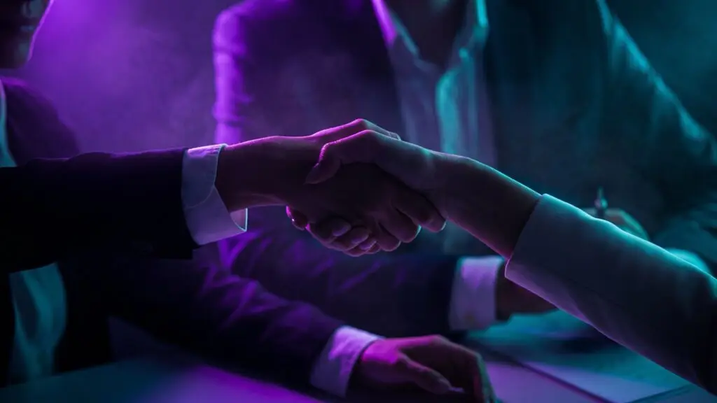 Business team meeting with a handshake